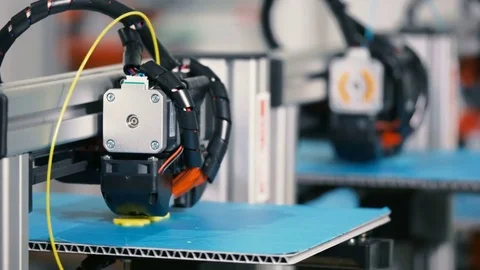 Industrial 3D Printing.The printer prints a 3D prototype parts modeled on the Stock Footage 78627682