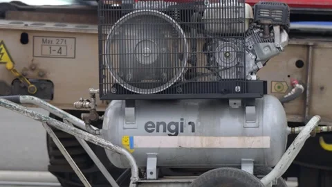 Industrial Air Compressor Closeup View of Mobile Gas Engine Pressure Tank at Vídeo Stock 338372046