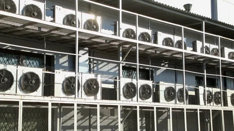 Industrial air conditioning system on wall outdoors. Rotating large fans Stock Footage 98124642