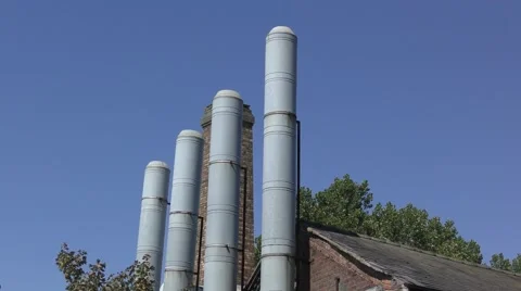 Industrial architecture ventilation stack deep blue sky old Stock Footage 65337729