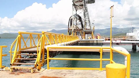 Industrial Area Dock for ship discharge of chemicals Stock Footage 33757142
