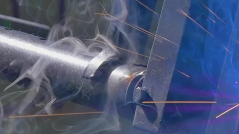 Industrial Argon Welding Robot Crafts Metal Pipes in Mesmerizing Slow Motion Stock Footage 340486683