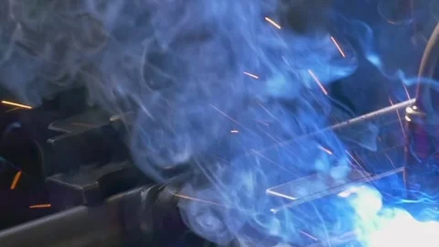 Industrial Argon Welding Robot Creates Mesmerizing Sparks in Slow Motion Stock Footage 341068187
