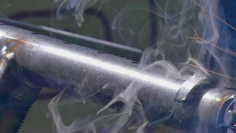 Industrial Argon Welding Robot Performing Precise Work on Metal Pipes Stock Footage 340486691