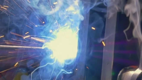 Industrial Argon Welding Robot Showcases Precision in Mesmerizing Slow Motion Stock Footage 341068229