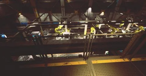 Industrial automation system in action within a manufacturing facility Stock Illustration