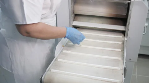 Industrial bakery workshop producing bread, buns and cookies. Video stock 321062736