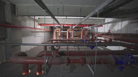 Industrial basement water fire suppression pipeline system in modern constr.. Stock Footage 337597359