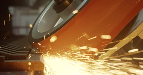 Industrial belt grinding machine processing metal part with bright sparks Stockbeeldmateriaal 329491802