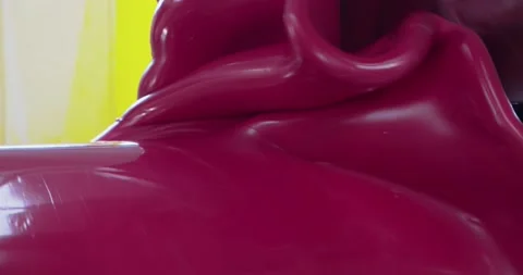 Industrial blending of plastic melted material, red blob, slow motion Stock Footage 154798531