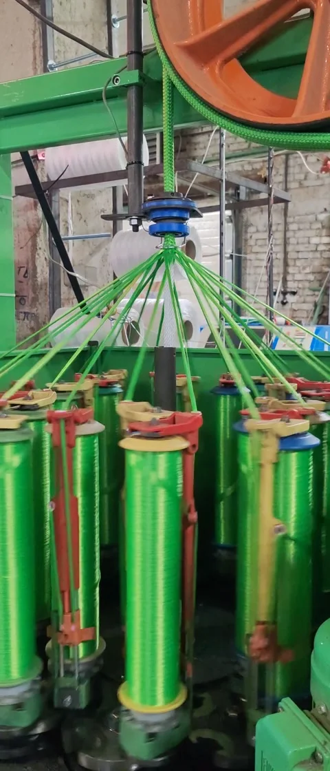 Industrial braiding machine in action: mechanical precision and technology Stock Footage 293147343