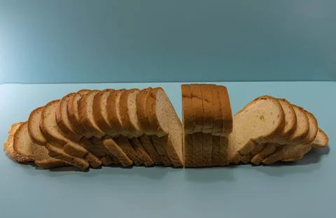 Industrial bread on blue background Stock Photos