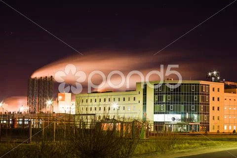Industrial Building At Night Time