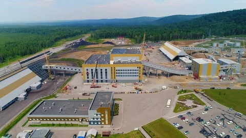 Industrial building under construction on the background of the forest. 스톡 동영상 103490014