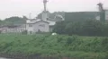 Industrial Buildings On Tama River On Rainy Foggy Day Zoom Out 4K 4k or 4k+ Resolution
