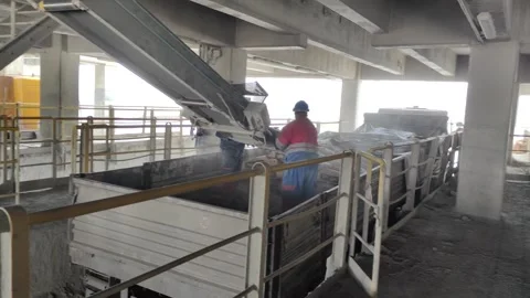 Industrial Bulk Loading of Cement into Trucks, Factory Interior, 4K Stock Footage 331361926