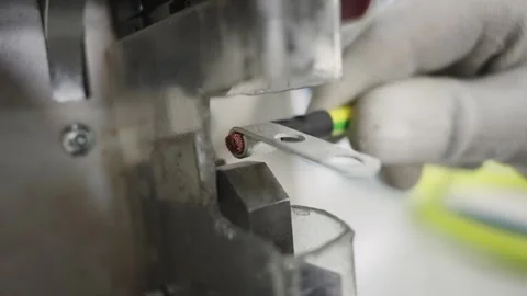 Industrial cable crimp manufacturing process in high-tech environment Stock Footage 331891486