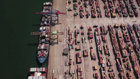 Industrial Cargo area with container ship in dock at port, Aerial view Video stock 95630569