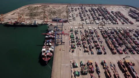 Industrial Cargo area with container ship in dock at port, Aerial view Stock-Footage 95634480