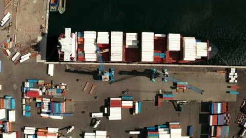 Industrial Cargo area with container ship in dock at port, Aerial view Stock Footage 167883156