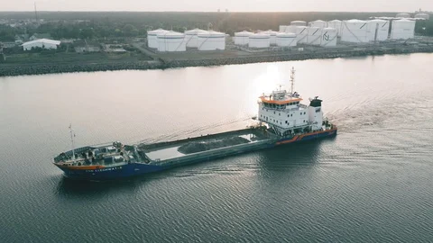 Industrial cargo freighter ship leaving port, aerial view 動画素材 111503601