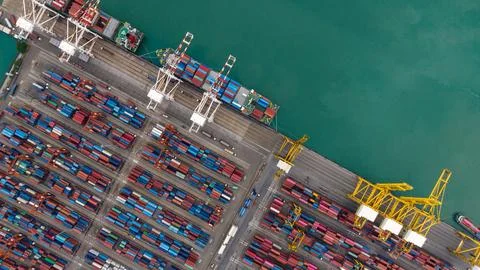 Industrial Cargo Ship Loading Intermodal Containers At Deep Sea Port In Si .. Stock Photos