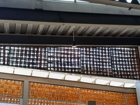 Industrial Ceiling With Brick Patterns and Modern Lighting Stock Photos