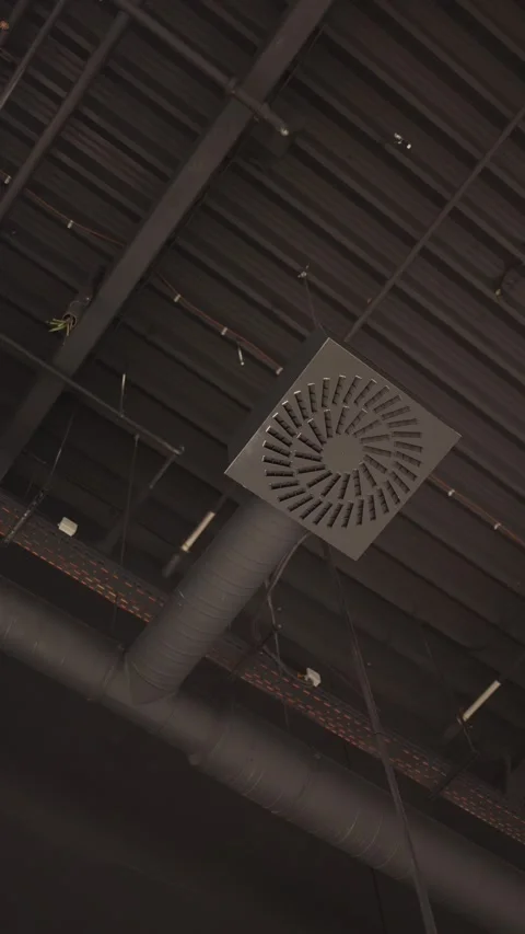 Industrial ceiling with ventilation diffuser and exposed air ducts Stock Footage 342913319