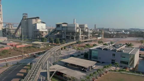 Industrial cement factory plant complex with high towers and processing Stock Footage 340358231