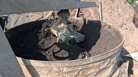 Industrial Cement Mixer Machine Blending Raw Aggregate for Construction Material Stock Footage 340505685