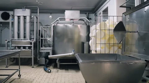 Industrial cheese making machinery producing curd Stock Footage 344824898