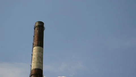 Industrial chimney with cloudy sky time lapse 4K Stock Footage 151719748