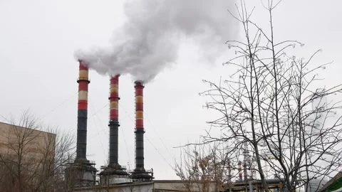 Industrial chimneys with heavy smoke causing air pollution  Stock Footage 262623937