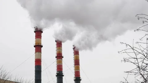 	 Industrial chimneys with heavy smoke causing air pollution Stock Footage 262623944