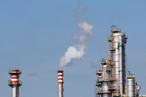 Industrial chimneys in a refinery Stock Photos