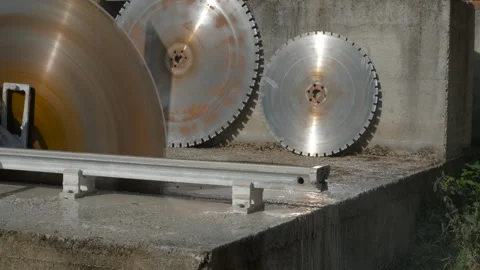 Industrial circular saw cutting through concrete wall Stock Footage 321136499