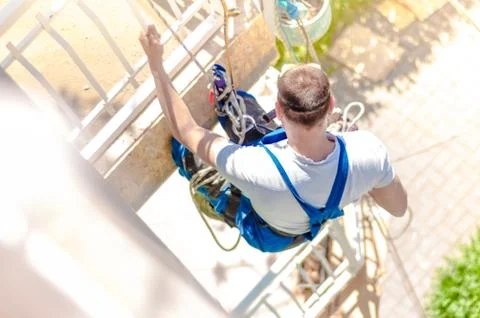 Industrial climber at work Stock Photos