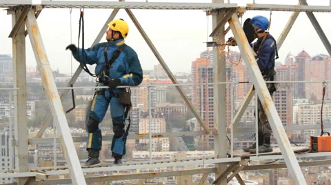Industrial Climber Works at a Height of Weld Design. Stock Footage 63533918