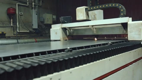 Industrial cnc laser cutting machine processing steel sheet Stock Footage 318189889