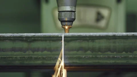 Industrial cnc laser cutting machine slicing through metal profile Stock Footage 318190257