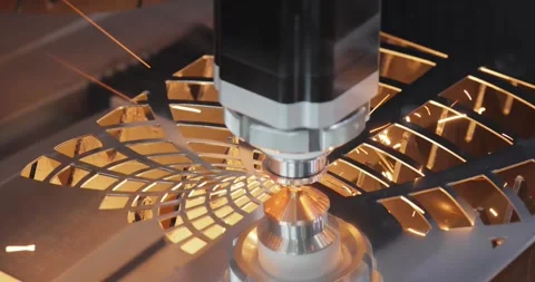 Industrial CNC laser cutting machine with flying sparks in metal fabrication. Stock Footage 345584375