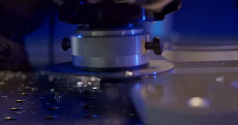 Industrial CNC milling machine head cutting through metal sheet Video stock 329477178