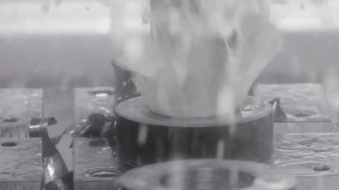 Industrial CNC milling machine process with coolant liquid splashing during.. Stock Footage 337349202