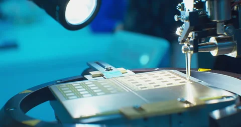 An industrial cnc robot works with a computer board microchip.Close-up. Stock Footage 152722522