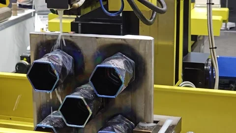 Industrial CNC Wire EDM Machine Cutting Precision Hexagonal Metal Tubes Stock Footage 336302527