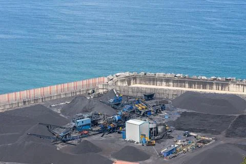 Industrial coal processing facility and conveyor machinery in Gijon sesport Stock Photos