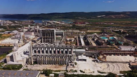 Industrial complex and river view in the daytime with clear sky Stock Footage 341328707