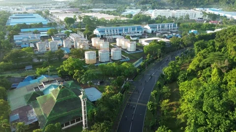 Industrial complex and storage facilities alongside a prominent mosque and .. Video stock 337284443