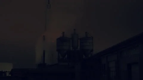 Industrial complex with chimney at night with smoke, pollution.  Stock Footage 143229142