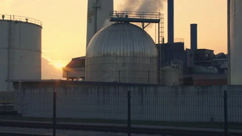 Industrial complex, chimneys in the sunset with smoke, pollution. Stock Footage 143232532
